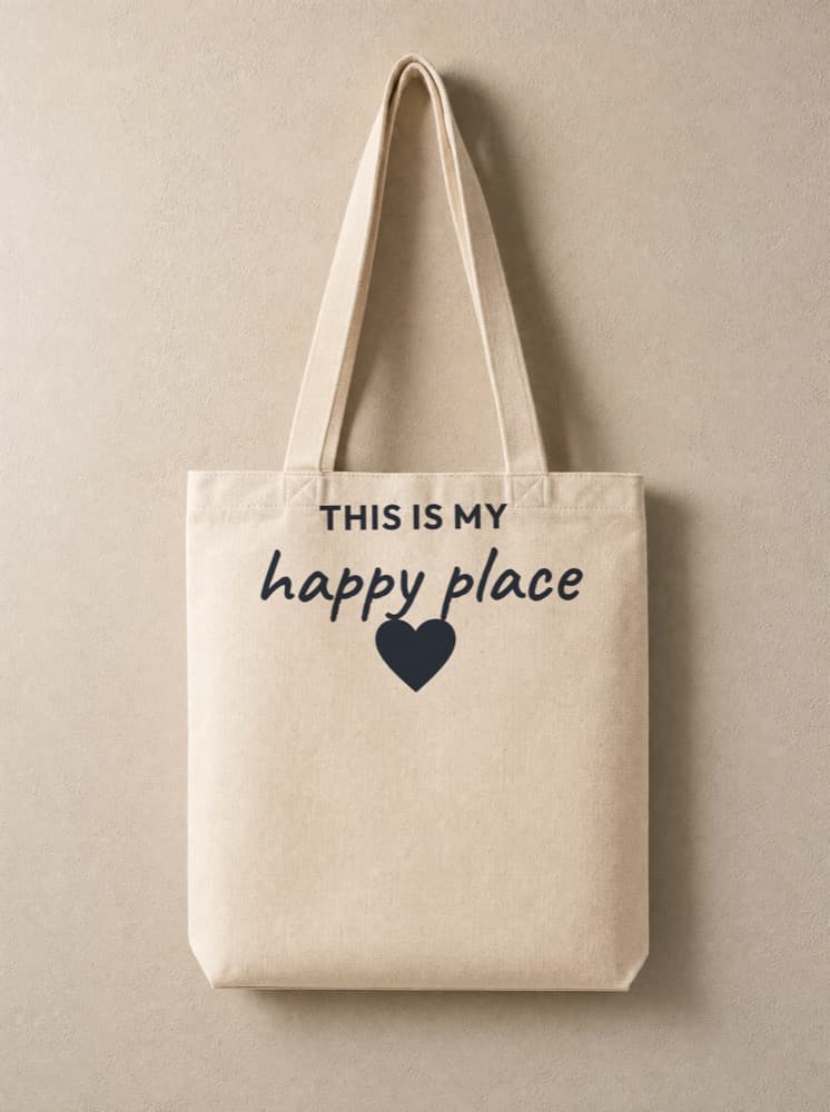 Cream canvas tote with the 'this is my happy place' design from the Collection
